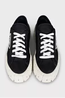 High-top sneakers with a logo