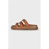 Brown sandals with gold hardware
