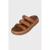 Brown sandals with gold hardware