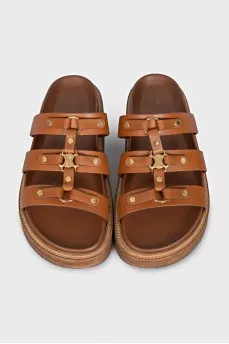 Brown sandals with gold hardware