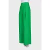 Wide green trousers