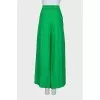 Wide green trousers