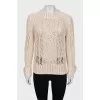 Jumper decorated with crystals