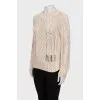 Jumper decorated with crystals
