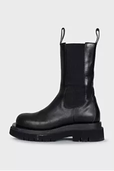 Leather boots with rough soles