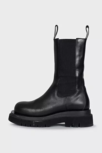 Leather boots with rough soles