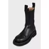 Leather boots with rough soles