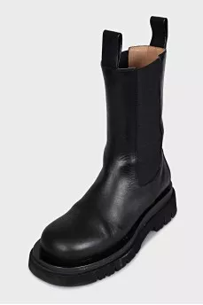 Leather boots with rough soles