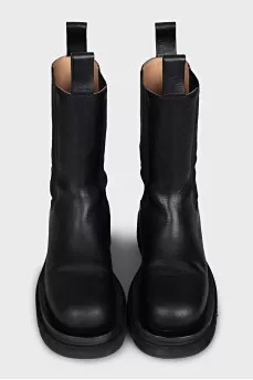 Leather boots with rough soles