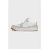 Sneakers with suede inserts