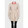 Reversible buttoned raincoat