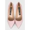 Pink leather pumps