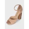 Suede sandals with clear heels