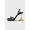 Sandals with golden heels