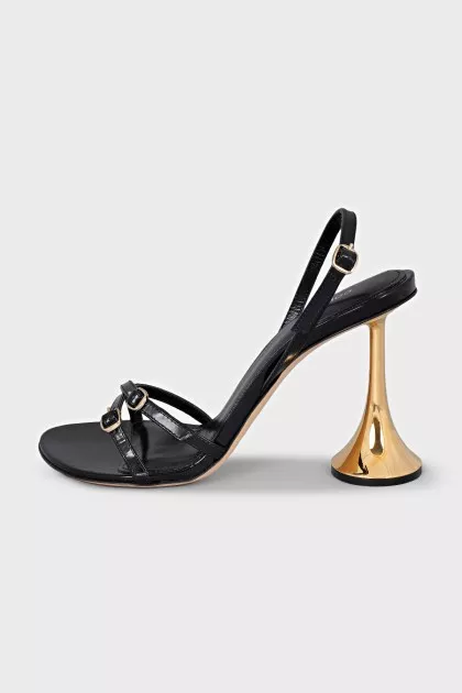 Sandals with golden heels