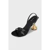 Sandals with golden heels