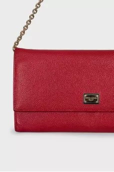 Red bag with a gold chain