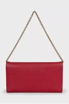 Red bag with a gold chain