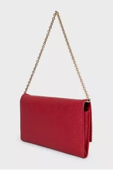 Red bag with a gold chain