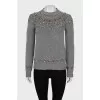 Gray sweater with crystals