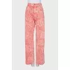 Pink jeans with a signature print