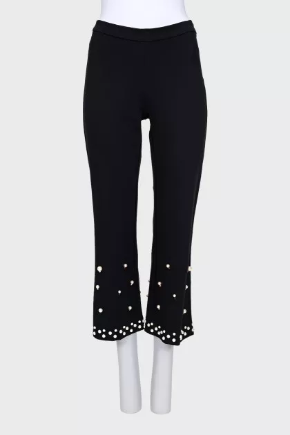 Trousers decorated with beads and crystals