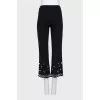 Trousers decorated with beads and crystals