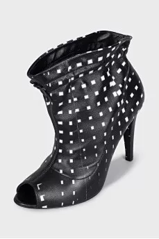 Leather ankle boots with print