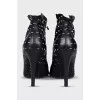 Leather ankle boots with print
