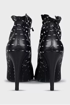 Leather ankle boots with print