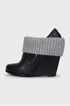 Leather ankle boots with a textile element