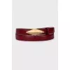 Leather belt with a gold buckle