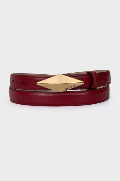 Leather belt with a gold buckle