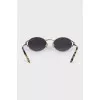 Sunglasses with animal-print temples