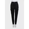 Black tapered wool trousers