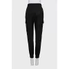 Black tapered wool trousers