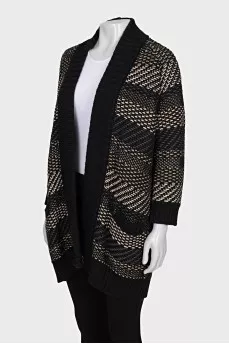 Knitted cardigan with a button
