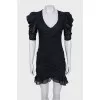 Black fitted dress with draping