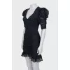Black fitted dress with draping