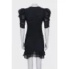 Black fitted dress with draping
