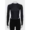 Black long sleeve top with a corset