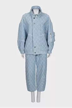 Suit consisting of a jacket and cropped trousers