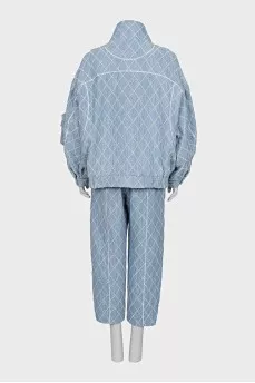 Suit consisting of a jacket and cropped trousers