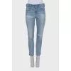 Mid-rise jeans with a ripped effect