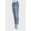 Mid-rise jeans with a ripped effect