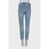 Mid-rise jeans with a ripped effect