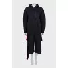A suit of a hoodie and cropped trousers