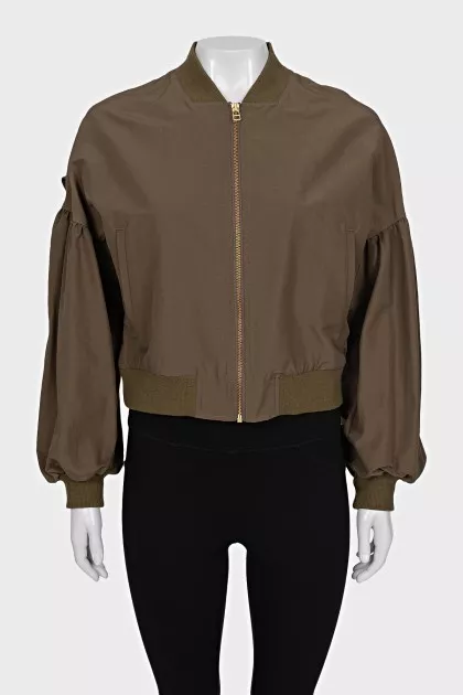 Bomber jacket decorated with bows