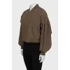 Bomber jacket decorated with bows