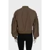 Bomber jacket decorated with bows